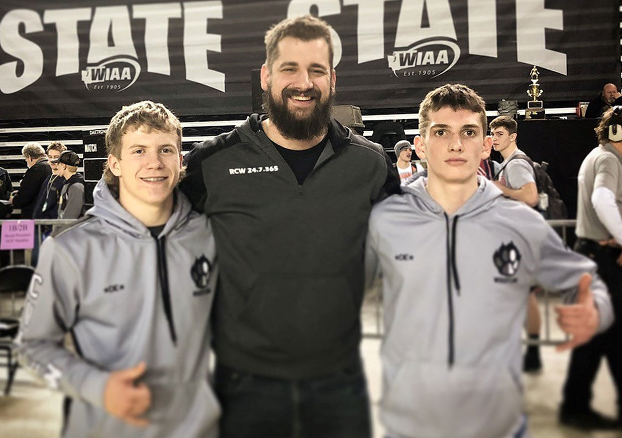 Republic/Curlew wrestlers, coach Noah Theckston